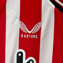 Kit Infantil Atlético de Bilbao I Castore 23/24 - Vermelho com detalhes em branco e preto