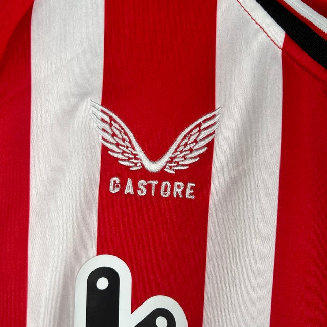 Kit Infantil Atlético de Bilbao I Castore 23/24 - Vermelho com detalhes em branco e preto