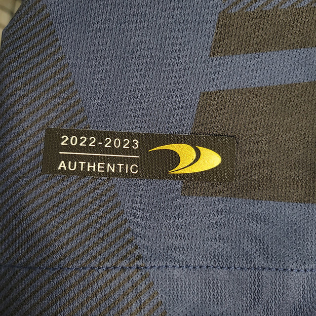 Camisa Al-Nassr Treino 23/24 - Torcedor Dunes Masculina - Azul com detalhes em preto e amarelo