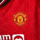 Camisa Manchester United I 23/24 -  Adidas Feminina - Vermelha com detalhes em preto e branco