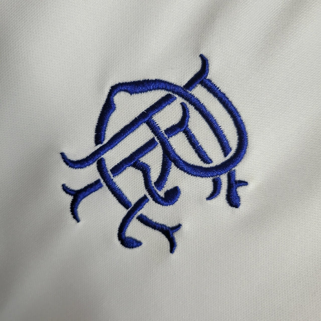 Kit Infatil Rangers II Castore 23/24 - Branco com detalhes em azul e vermelho