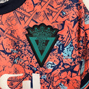 Kit Infantil Cadiz Edição Especial Macron 23/24 - Laranja com detalhes em azul e branco