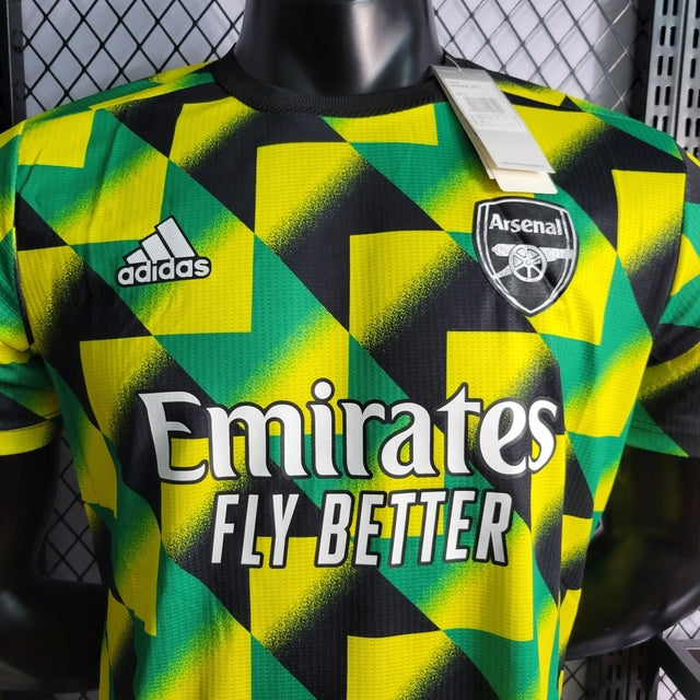 Camisa Arsenal Pré-Jogo 22/23 Jogador Adidas Masculina - Amarelo, preto e verde.