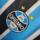 Camisa Grêmio I 23/24 -  Umbro Feminina - Azul com listras pretas e brancas