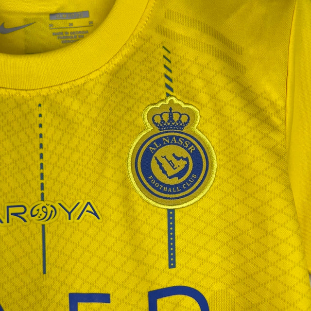 Kit Infantil Al-Nassr I Nike 23/24 - Amarelo com detalhes em azul
