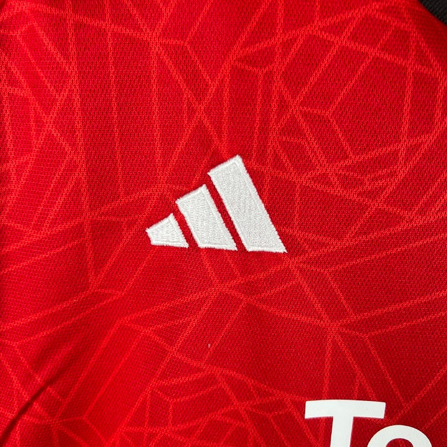 Camisa Manchester United I 23/24 -  Adidas Feminina - Vermelha com detalhes em preto e branco