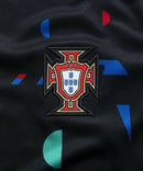 Camisa Seleção de Portugal Pré-jogo 24/25 - Torcedor Nike Masculina - Preta com detalhes em azul e vermelho e verde