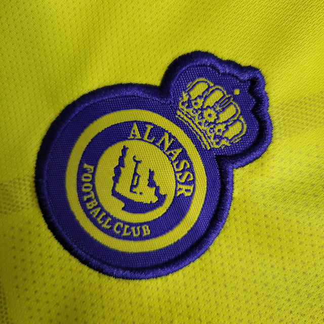 Kit Infantil Al-Nassr I 22/23 - Amarelo com detalhes em azul