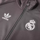 Jaqueta Corta-Vento Real Madrid 25/26 - Masculina Adidas - Cinza