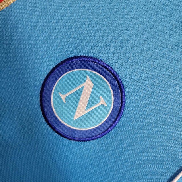 Kit Infantil Napoli I 23/24 - EA7 - Azul com detalhes em vermelho e verde