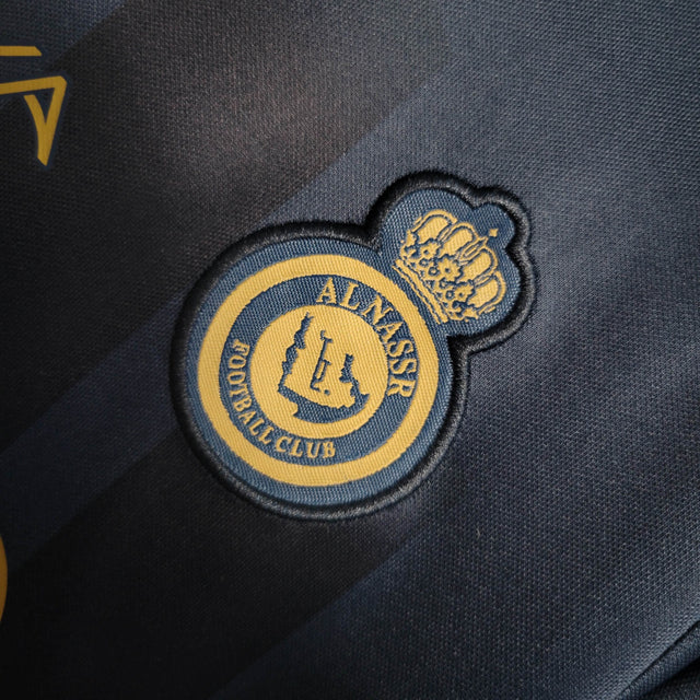 Kit Infantil Al-Nassr I Nike 23/24 - Azul com detalhes em dourado