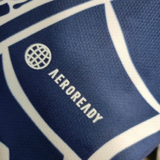 Camisa Real Madrid Edição Especial 23/24 - Torcedor Adidas Masculina - Azul com detalhes em branco e amarelo