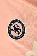 Kit Treino adulto - Camisa e Shorts - Chelsea Nike 25/26 - Salmão com detalhes em azul