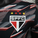 Camisa São Paulo Treino 24/25 - Jogador New Balance Masculina - Preta com detalhes em vermelho e branco