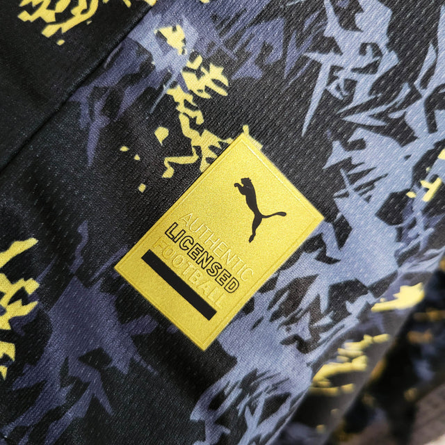 Camisa Manchester City Edição especial 23/24 - Torcedor Puma Masculina - Preta com detalhes em azul e dourado