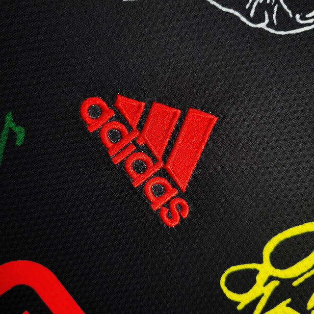 Camisa Ajax Edição Especial 23/24 - Torcedor Adidas Masculina - Preta com detalhes em homenagem ao Bob Marley