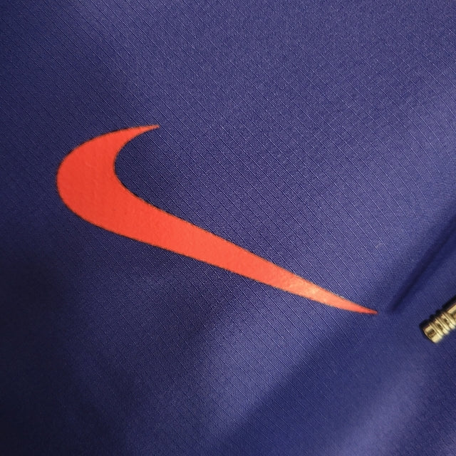 Jaqueta Corta-Vento Paris Saint Germain 23/24 - Masculina Nike - Azul