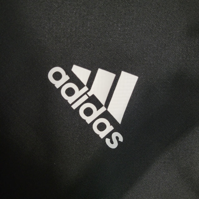 Jaqueta Corta-Vento Real Madrid 23/24 - Masculina Adidas - Preta