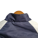 Jaqueta Corta-Vento Flamengo 23/24 Masculina Adidas - Azul com a manga branca com detalhes em azul e amarelo