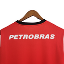 Camisa Flamengo I Retrô 07/08 Torcedor Masculina - Vermelha e preta com detalhes em dourado no escudo