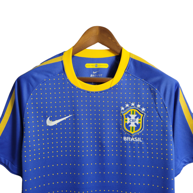 Camisa Seleção Brasileira II Retrô 2010 Nike Torcedor Masculina - Azul com detalhes em amarelo