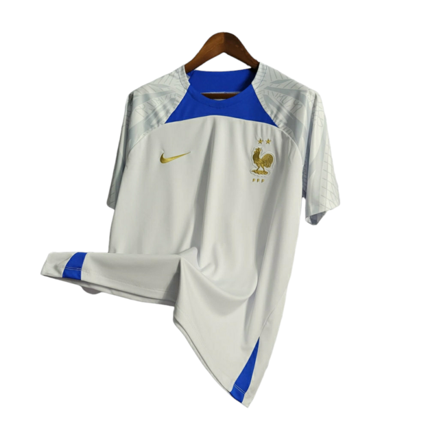 Camisa Seleção da França Treino 22/23 - Torcedor Nike Masculina - Branca com detalhes em azul e dourado