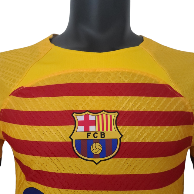 Camisa Barcelona II 22/23- Jogador Nike Masculina - Amarela com detalhes em vermelho