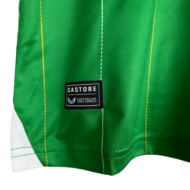 Kit Infantil Irlanda I Castore 23/24 - Verde com detalhes em laranja