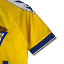 Kit Infantil Cadiz I Macron 23/24 - Amarelo com detalhes em azul