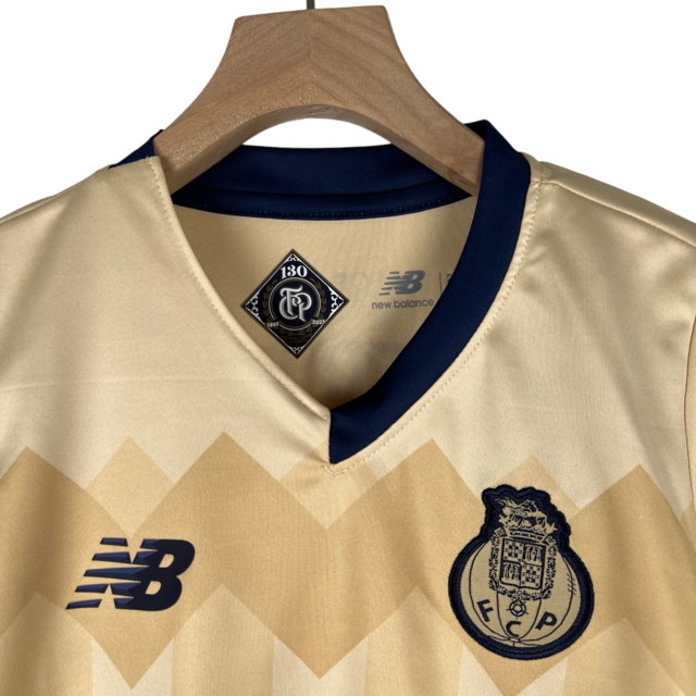 Kit Infantil Porto II New Balance 23/24 - Dourado com detalhes em azul