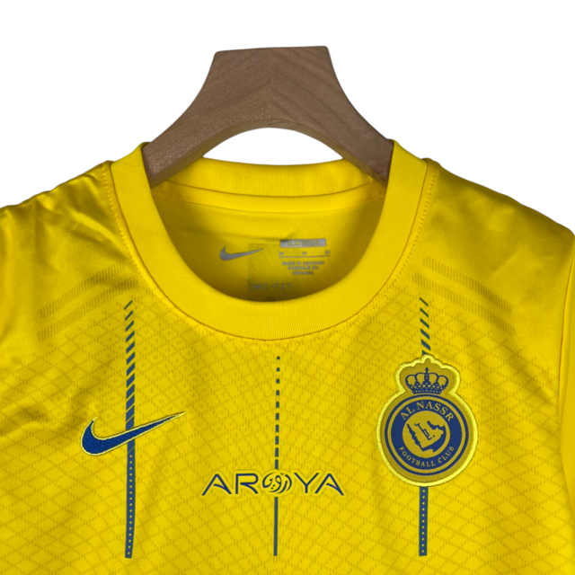Kit Infantil Al-Nassr I Nike 23/24 - Amarelo com detalhes em azul