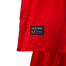 Kit Infantil Sevilla II Castore 23/24 - Vermelho com ondulações cinza e dourado