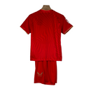 Kit Infantil Sevilla II Castore 23/24 - Vermelho com ondulações cinza e dourado