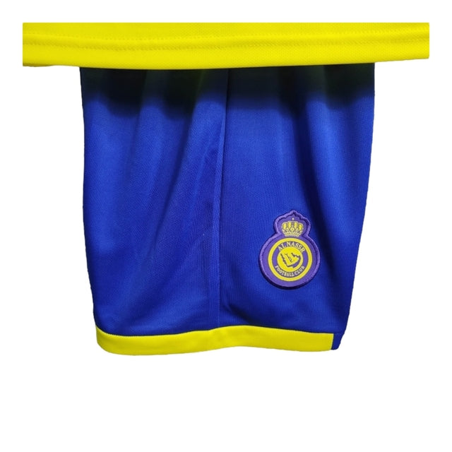 Kit Infantil Al-Nassr I 22/23 - Amarelo com detalhes em azul