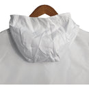 Jaqueta Corta-Vento Real Madrid 23/24 - Masculina Adidas - Branca e preta com detalhes em bege