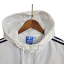 Jaqueta Corta-Vento Real Madrid 23/24 - Masculina Adidas - Azul e branca