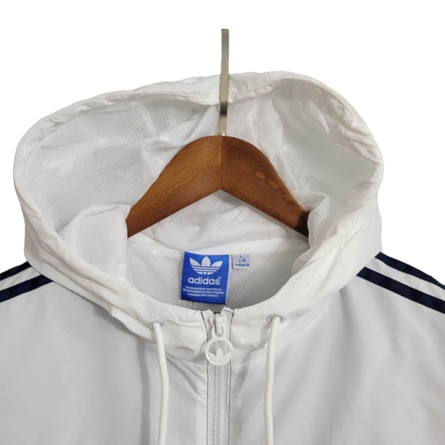Jaqueta Corta-Vento Real Madrid 23/24 - Masculina Adidas - Azul e branca