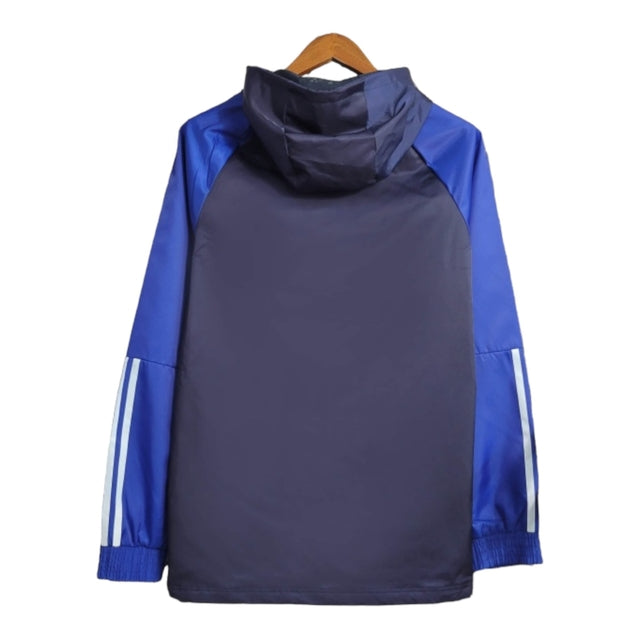 Jaqueta Corta-Vento Manchester United 23/24 - Masculina Adidas - Azul com detalhes em branco