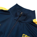 Jaqueta Corta-Vento Barcelona 25/26 - Masculina Nike - Azul com detalhes em vermelho e amarelo
