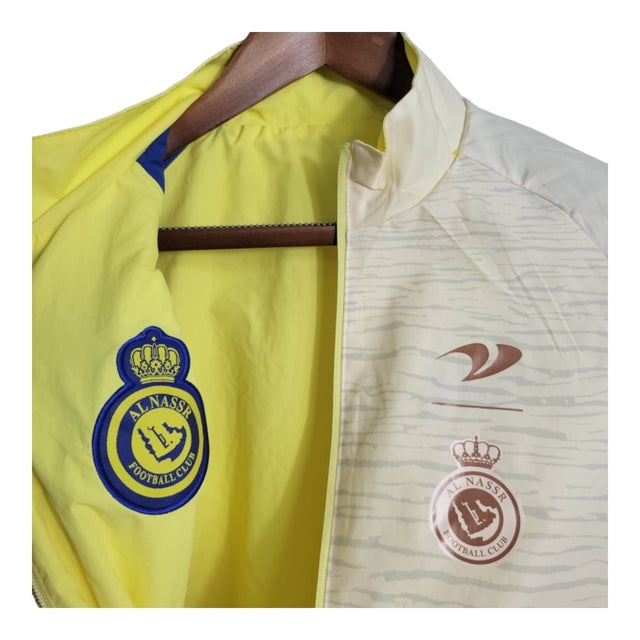 Jaqueta Corta-Vento Al-Nassr 23/24 dupla face - Masculina Dunes - Amarela com detalhes em azul