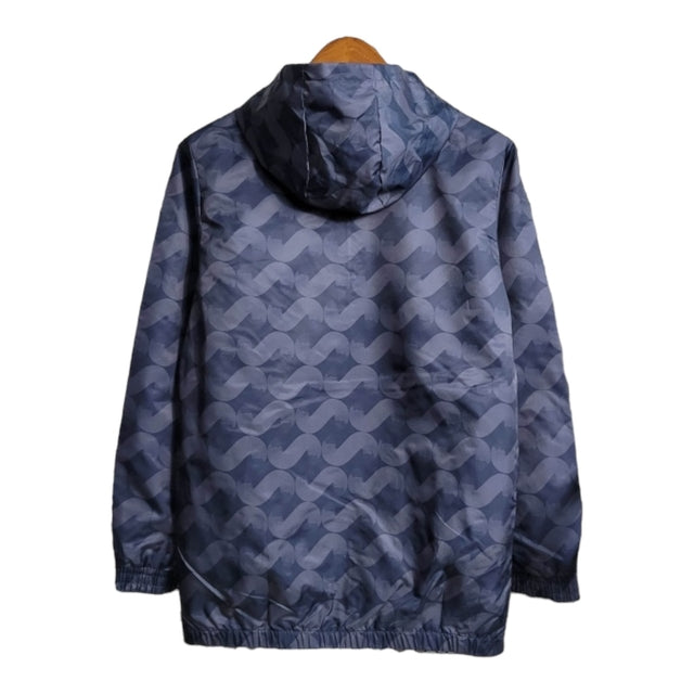 Jaqueta Corta-Vento Real Madrid II 23/24 - Masculina Adidas - Azul com listras pretas