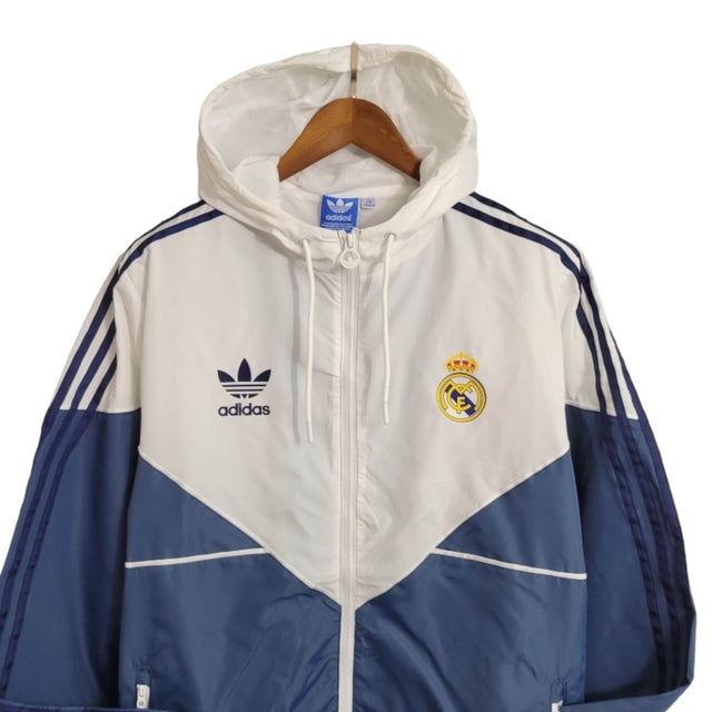 Jaqueta Corta-Vento Real Madrid 23/24 - Masculina Adidas - Azul e branca
