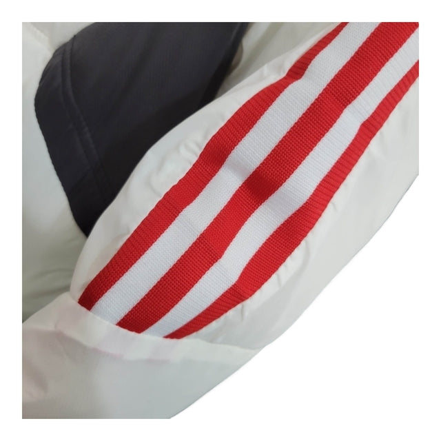 Jaqueta Corta-Vento Manchester United 23/24 - Masculina Adidas - Branca com detalhes em vermelho