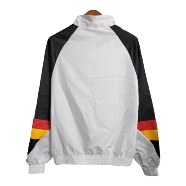 Jaqueta Corta-Vento Manchester United 23/24 - Masculina Adidas - Branca com detalhes em preto e vermelho e amarelo