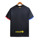 Camisa Barcelona 23/24 Polo - Torcedor Nike Masculina - Preta com detalhes em azul e vermelho