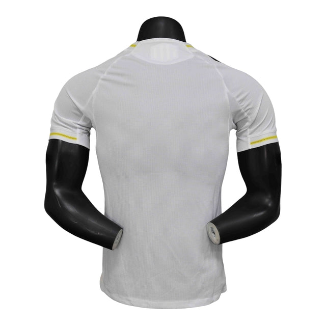 Camisa Real Madrid I 25/26 - Jogador Adidas Masculina - Branca com detalhes em amarelo