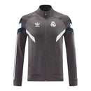 Jaqueta Corta-Vento Real Madrid 25/26 - Masculina Adidas - Cinza