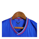 Kit Infantil Rangers Clube I 23/24 - Castore - Azul com detalhes em branco