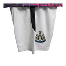 Kit Infantil Newcastle United Edição Especial 23/24 - Castore - Preto com detalhes em branco