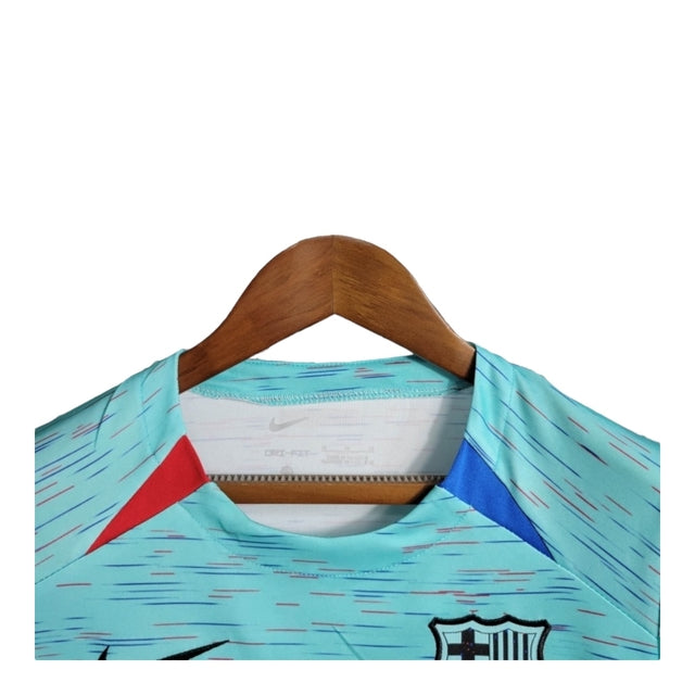 Kit Infantil Barcelona II 23/24 - Nike - Verde com detalhes em azul e vermelho